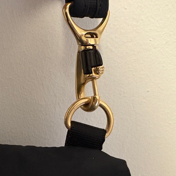 Pacsafe Black Crossbody Bag with Gold Accent - Picture 3 of 6